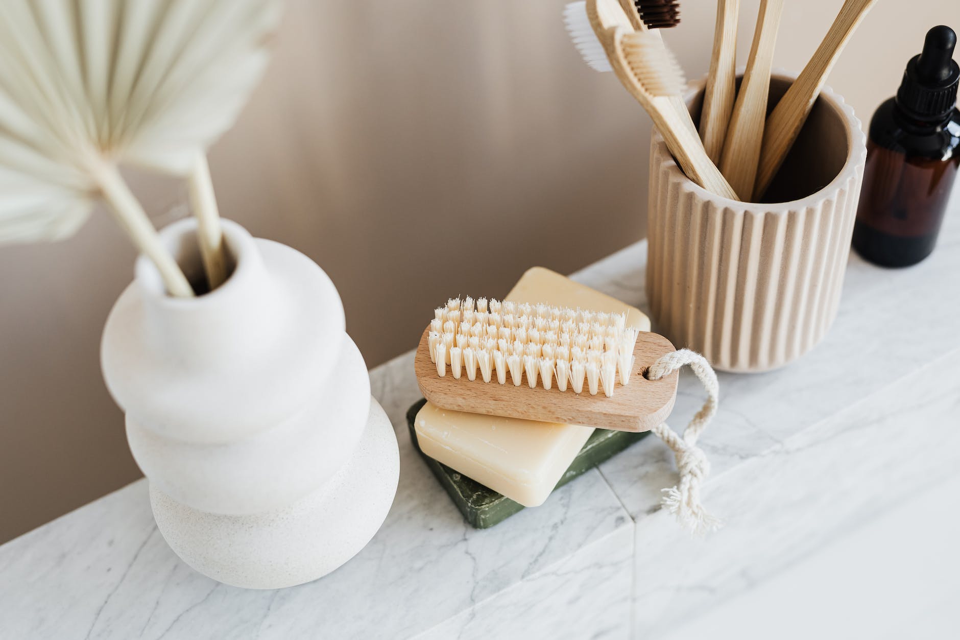 set of natural toiletries on marble tabletop