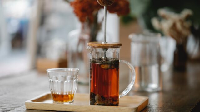 hot herbal tea brewing in french press
