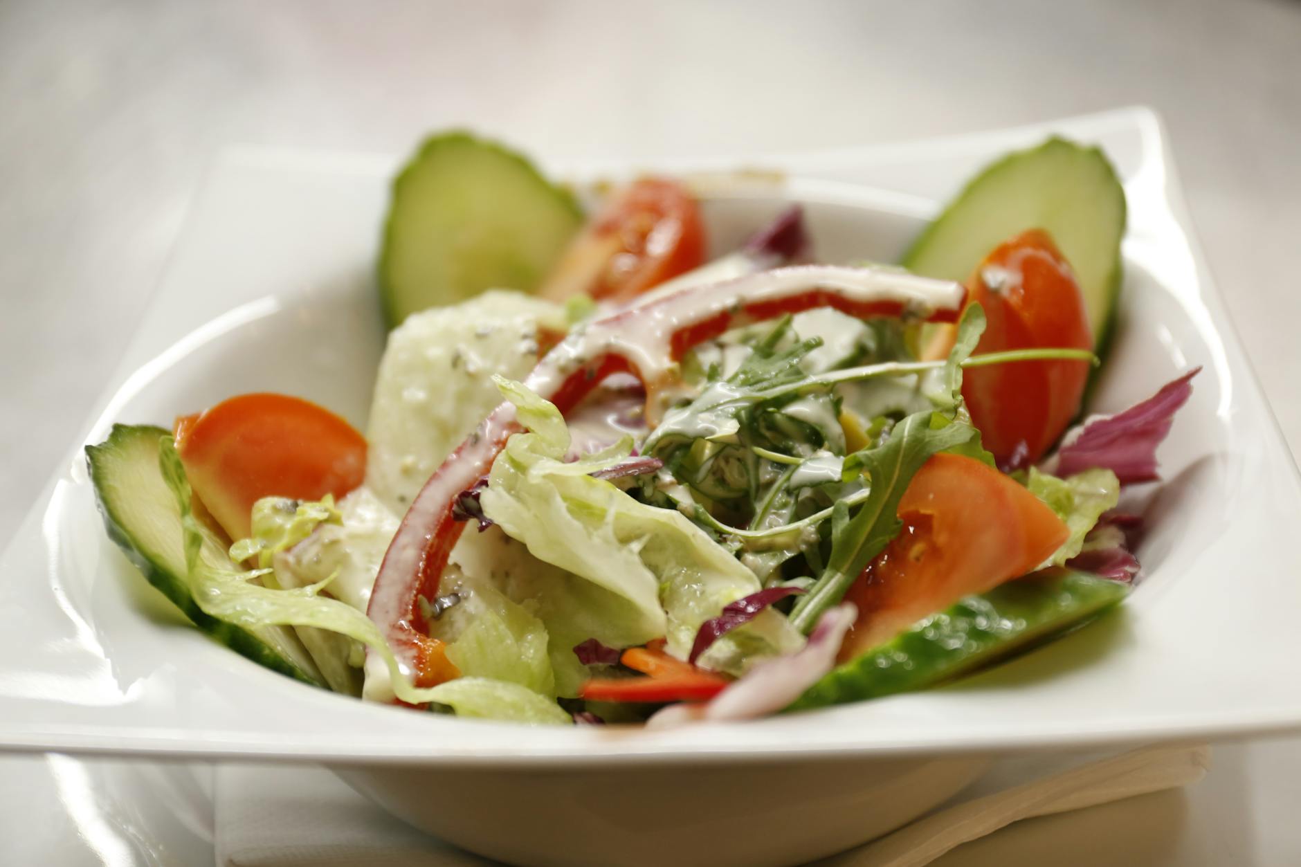 close up photo of vegetable salad on bowl